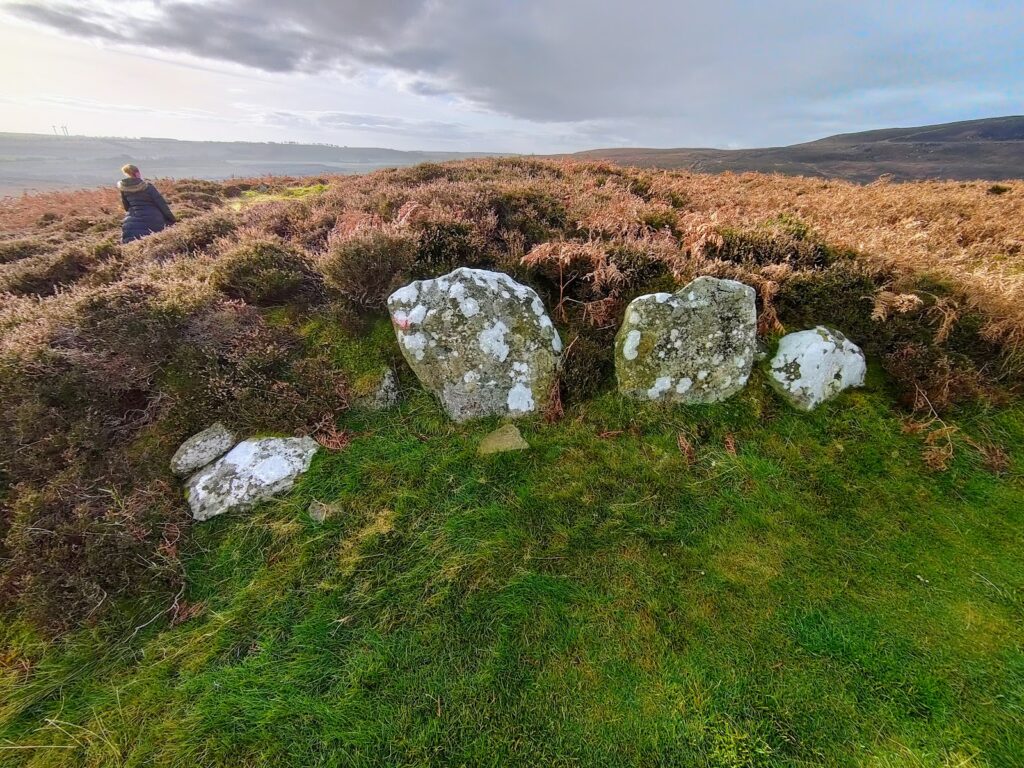 a soltude girl setting it the Simonside Hills 